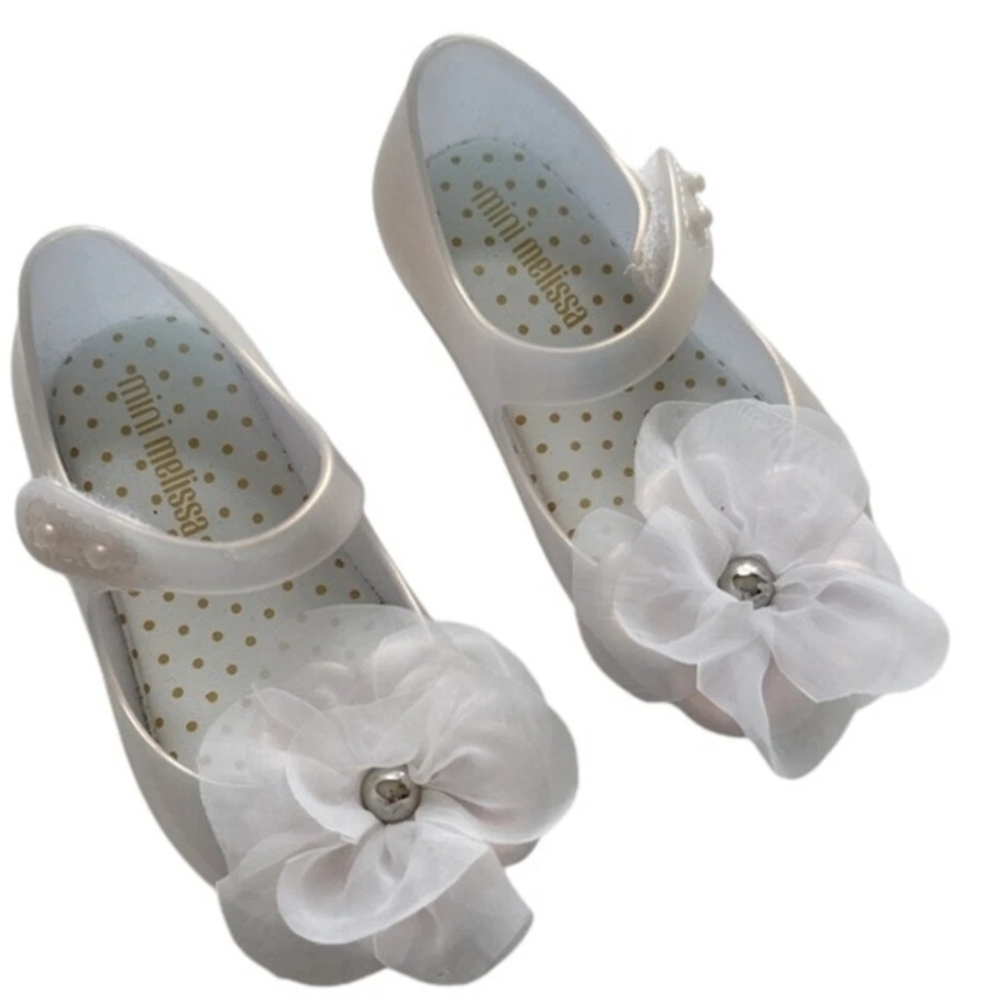 Mini Melissa Ultragirl Flower BB flats in a pearly white color. 